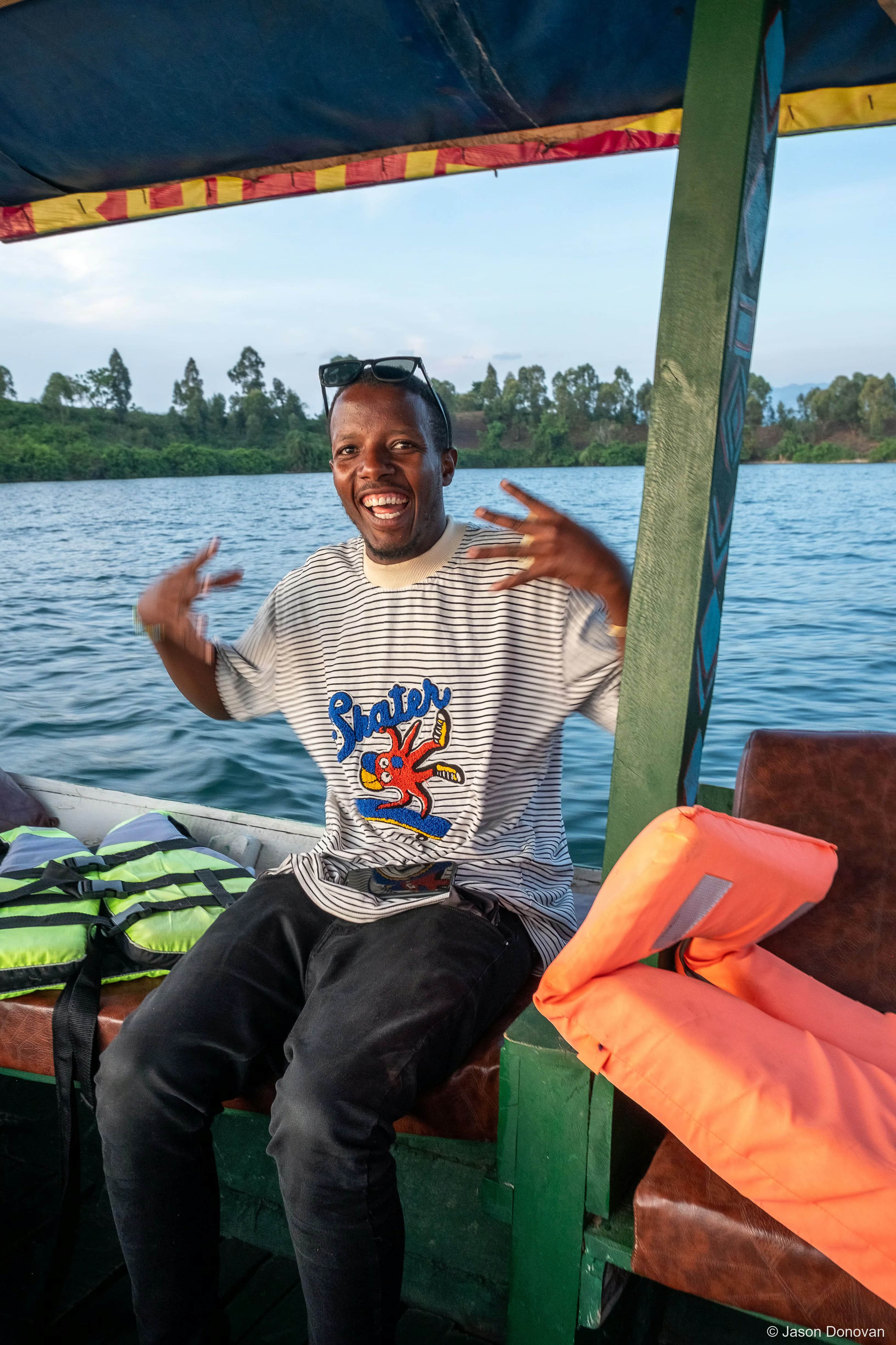 Local Boat Captain Rwanda photography by Jason Donovan