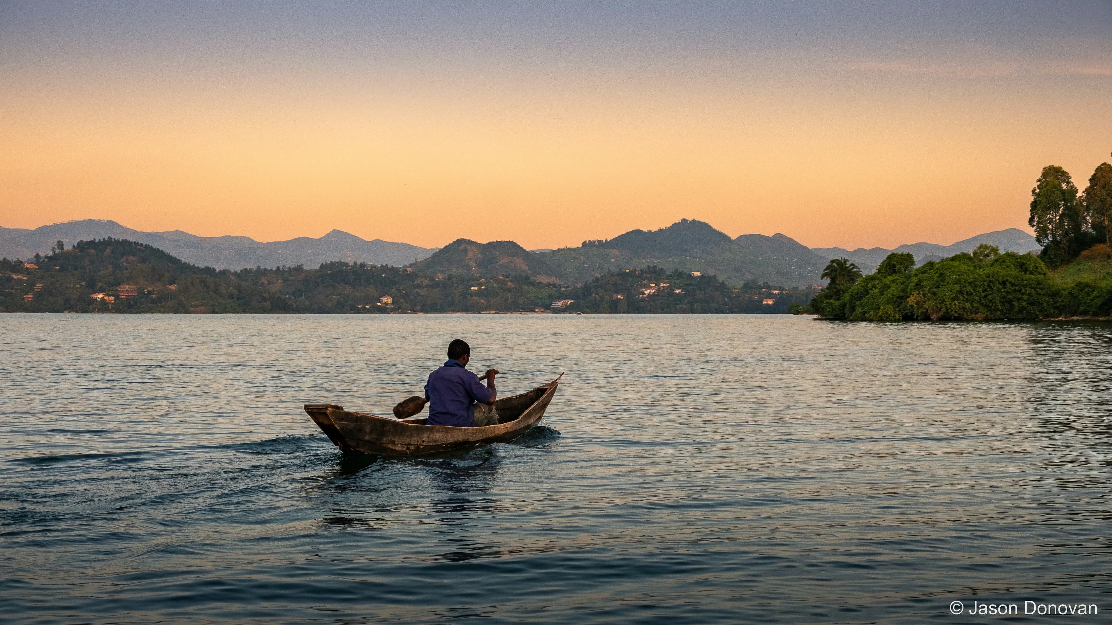 Wooden Canoe at Sunset Rwanda photography by Jason Donovan