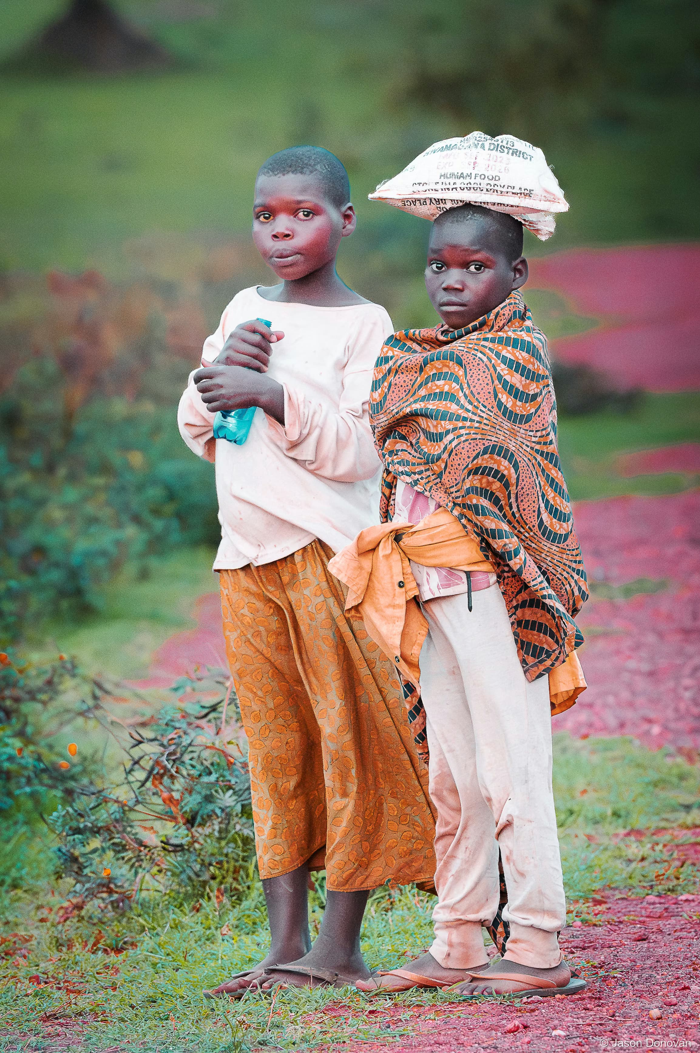 Local children near Akagera Rwanda photography by Jason Donovan