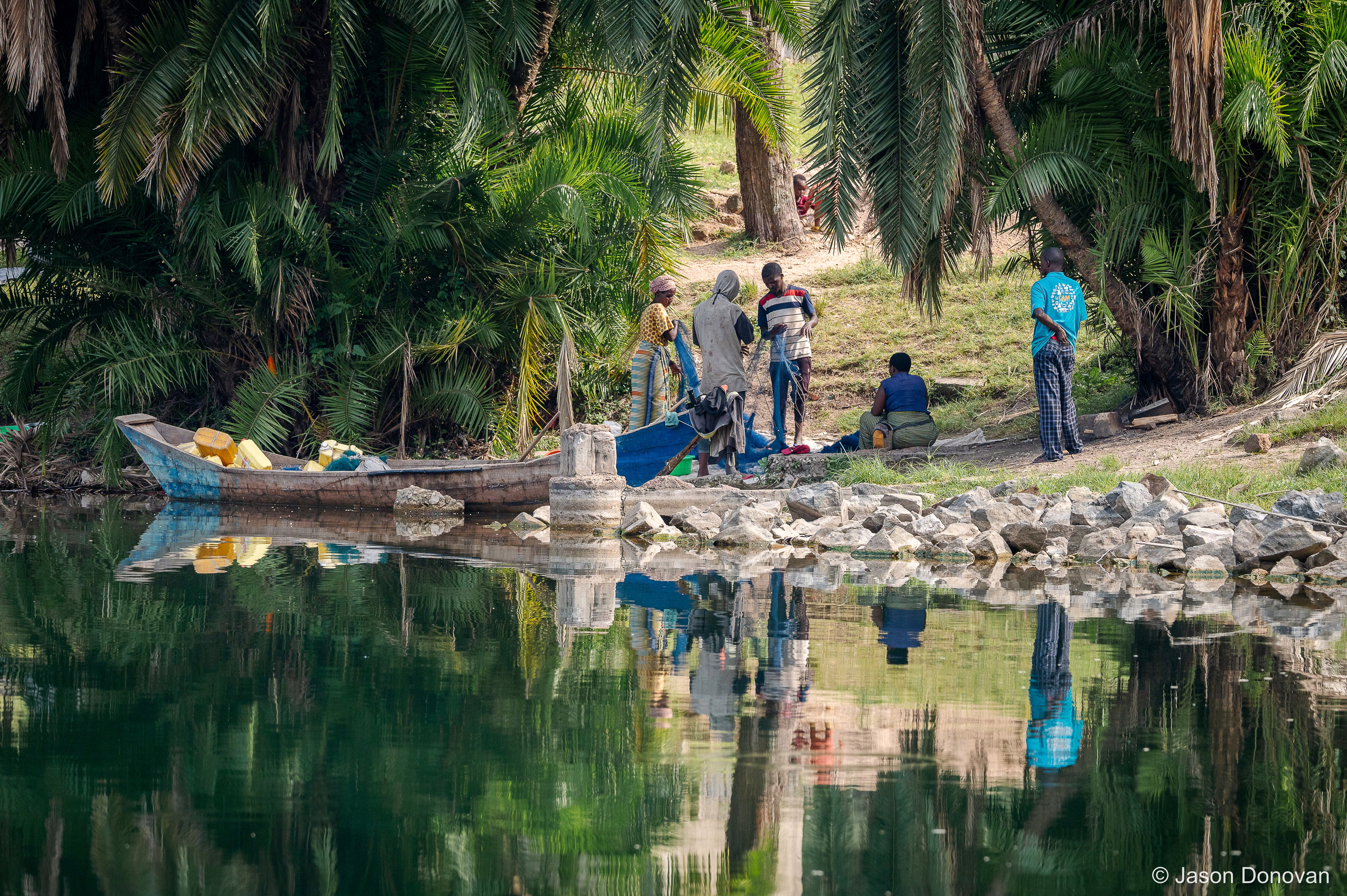 Preparing for a fishing trip Rwanda photography by Jason Donovan