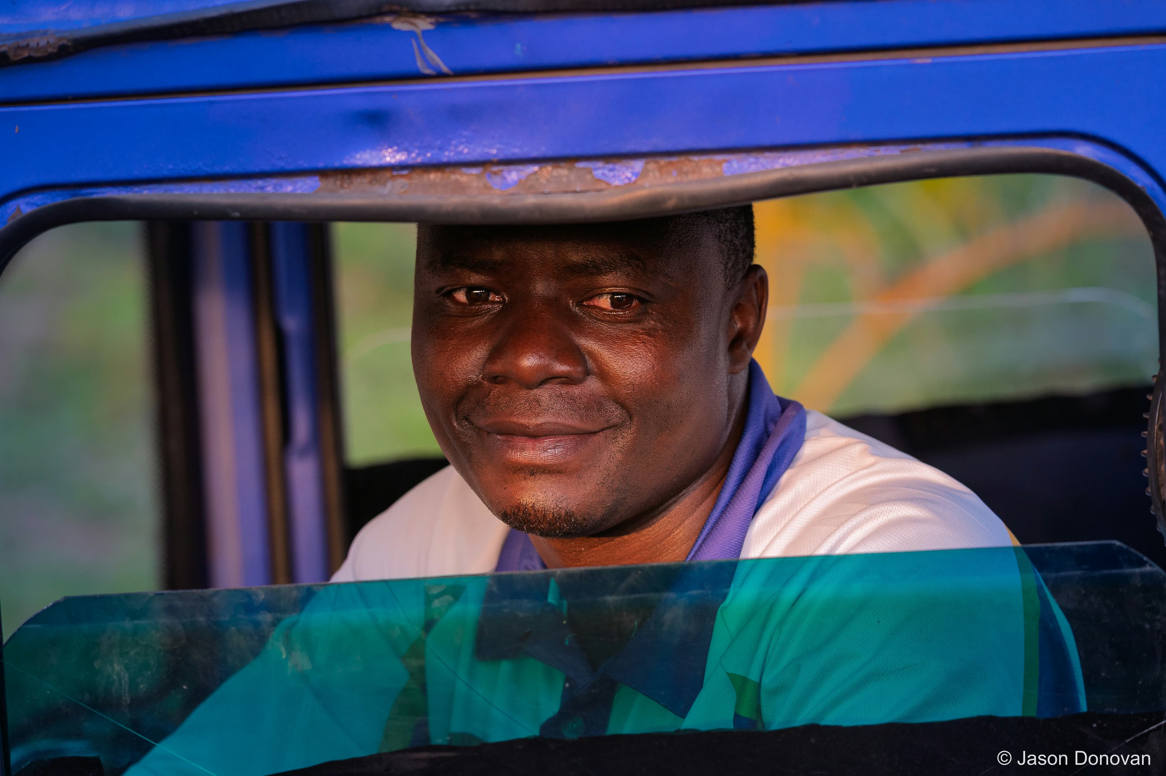 Van driver in Kigali Rwanda photography by Jason Donovan
