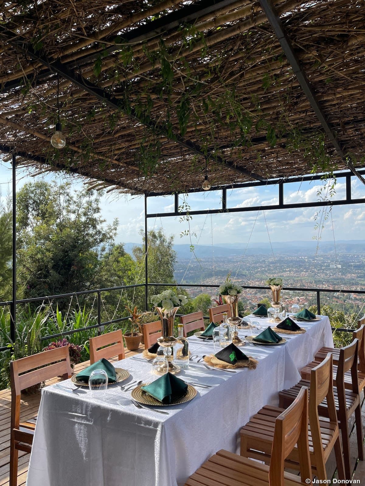 Elegant outdoor dining terrace with panoramic valley view Rwanda